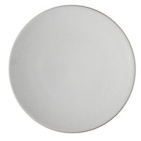 The Jars - Rosenthal Tourron Dinnerware Neige is a handmade, round white plate with a textured surface, crafted in France—ideal for those who want elegant and durable dinnerware.