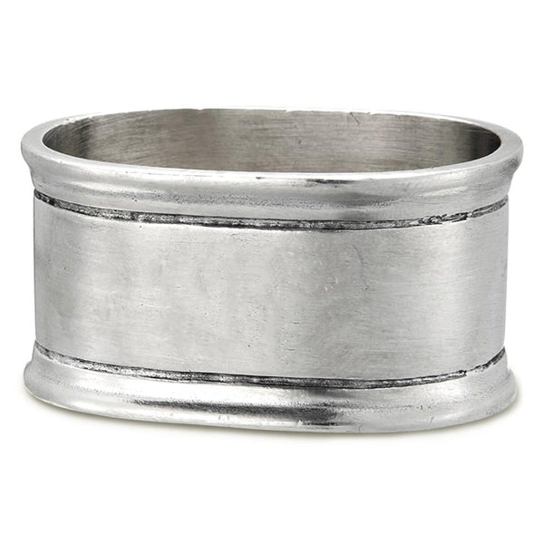 The MATCH Oval Napkin Ring Set of Two features a subtly oval shape with a brushed silver finish and two engraved lines, handcrafted in the signature MATCH style.