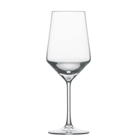 A Zweisel Pure Barware wine glass by Zwiesel Fortessa, featuring a long stem and wide bowl, crafted from premium Tritan material, is displayed empty on a white background.