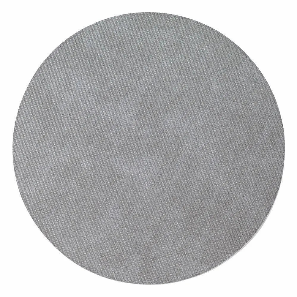 The Bodrum Pronto Round Placemat Grey Set of 4 features circular gray, textured placemats made from phthalate-free vinyl. Easy to clean and ideal for daily use, they're shown against a white background.