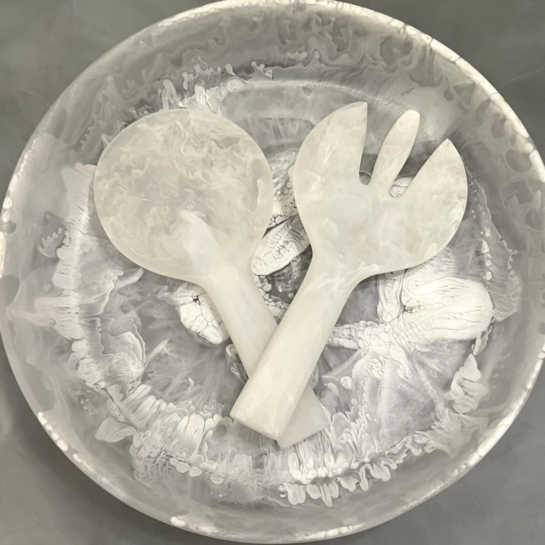 White swirl resin jumbo servers on resin plate. 