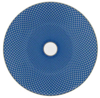 The Tresor Dinnerware Blue round plate by Raynaud features a blue geometric woven pattern radiating from a white center, with a thin white edge that enhances its formal elegance.