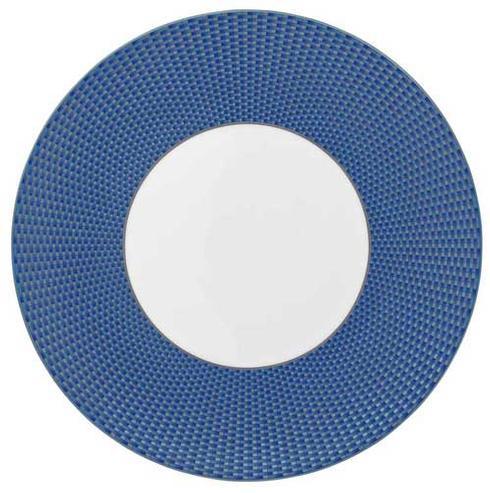 The Raynaud Tresor Dinnerware Blue round plate features a textured blue rim and smooth white center—ideal for formal, elegant settings and viewed from above.