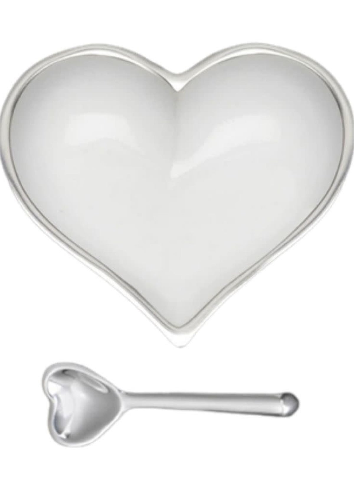 The Inspired Generations Happy Heart Snack Bowl & Spoon features a white, heart-shaped dish and matching spoon with shiny silver accents—perfect for showcasing your Happy Hearts Bowls collection.