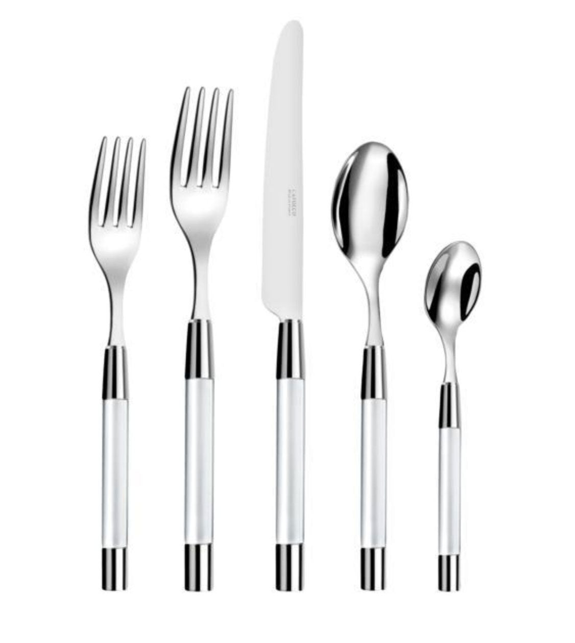 The Capdeco Zoe Flatware 5 Piece Setting - Clear, made in France, features stainless steel forks, knife, tablespoon, and teaspoon with shiny metallic heads and elegant clear handles with silver accents.